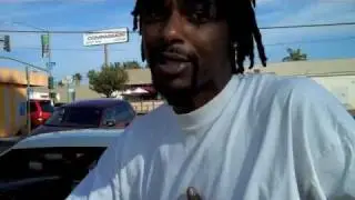 weezy (white shoes ) 2.0 IN FRONT OF  THE SHOP
