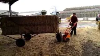 Straw bale moving with a GoodsMan 300 fitted with a towbar