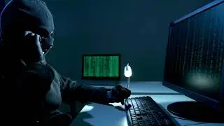 VideoVault Stock Video: Hacker blackmails person he hacked over phone