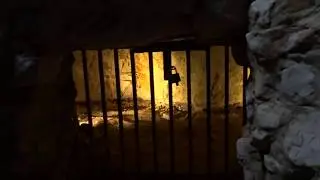 Descending to Grimes Graves Prehistoric Flint Mine (English Heritage) near Thetford Norfolk England