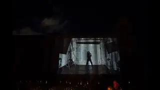 Nicole Chochrek dancing on a grain silo to the music of Charlie Martin
