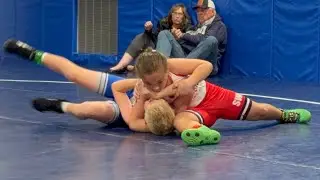 Oliver wins with a Head and arm throw!
