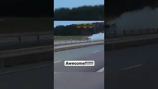 Traffic halted for the street burnout from Funny car..