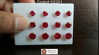 Shree Sai Jewelry | Silver earring studs with diamond shaped red stone
