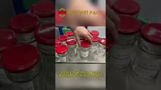 Rolling-type round bottle labeling machine (glass bottles) #labeling #labelapplicator #shorts