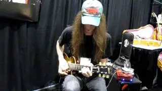Scotti Hill from Skid Row noodling on a HiStrung Octave at 2012 NAMM