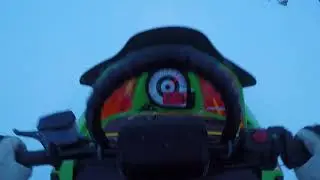 Arctic Cat out sledding.