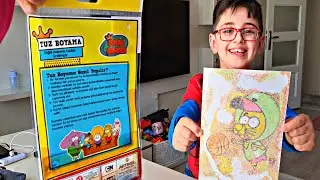 Efe ile kum boyama yaptık.