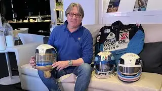 Former F1 driver Beppe Gabbiani shows Darren his Bell helmets from his career.