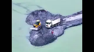 Carrying rocks to fill the sea to build a highway to the island #bull