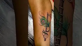 Peacock feather with flute Tattoo￼
