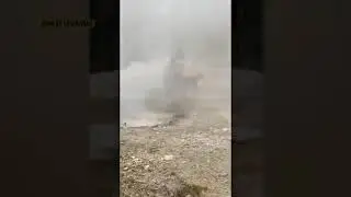 2nd video of a man near thermal feature in Yellowstone National Park