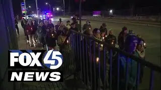 Families unite in candlelight walk as Baltimore homicide rate drops by 23% in 2024