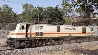 16340 Nagercoil - Csmt on newly ballasted track with heavy tracksounds rushes towards Shivajinagar