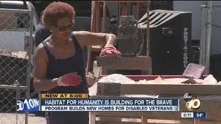 Volunteers help build homes for disabled veterans