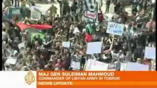 More Libyan cities fall to the opposition