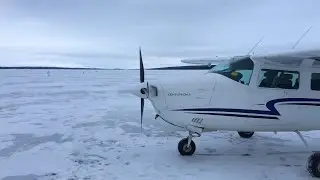 Cessna 210 Off field landing on a frozen lake
