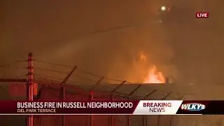 Massive fire burns through warehouse with flammable chemicals in west Louisville