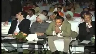 Gurdaas Maan respecting Dharmendra on live stage show ( legends together)