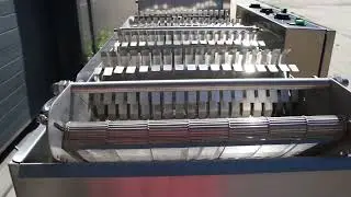 Paddle conveyor for the modular continuous fryer for frying the thin slices of products.