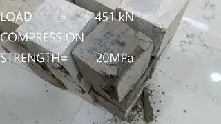 After curing for 14 days, 'compression test' on cube samples taken from slab casting.
