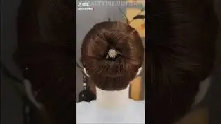SIMPLE TWISTED  BUN IN MINUTES. #Shorts #YTShorts #Trending #BridalUpdo.