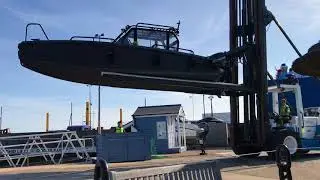 Launching an XO Boats' Defender (XO DFNDR) by forklift from a drystack