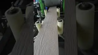 Hegu PE WPC co extrusion embossing decking machine (Sophie@wpcmachinery.com)
