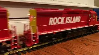 CNW and Rock Island GP40's pull a Cotton Belt & Golden West Service Consist