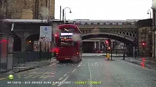 Driver runs a red light with bus full of passengers
