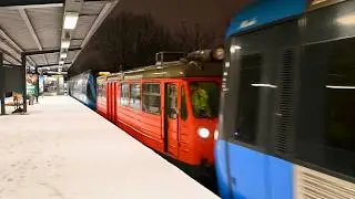 The snowblower train in the Stockholm Metro passes through Abrahamsberg