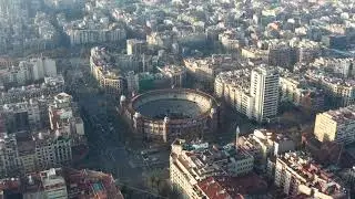 AERIAL: Over La Monumental in Barcelona, Spain on beautiful sunny day