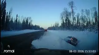 Car crashes into ditch after failed overtake on snowy road in Leningrad, Russia