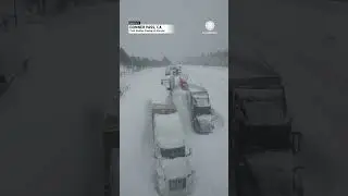 Drone Footage: Trucks Trapped in Snow in California