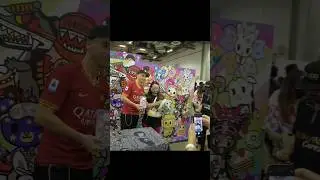 Simone Legno signing at the Tokidoki booth