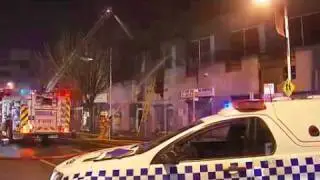 Fire threatens boarding house