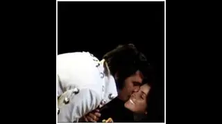 Elvis Presley kissing and being playfull with women fans on stage of Las Vegas