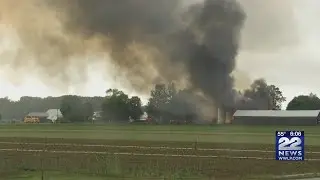 Local fire crews work to put out large Amherst barn fire