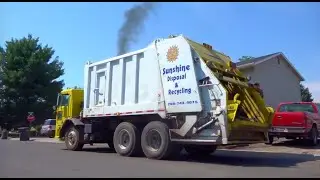 Roaring 1988 Peterbilt 310 - Heil 5000 Rear Loader