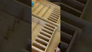 Kid playing oversized pinball table