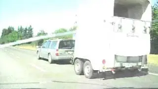 Volvo towing a two horse trailer