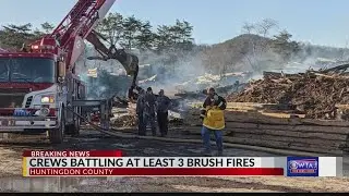 Crews work to contain brush fire in Huntingdon County lumber yard