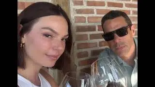 Isis Valverde e Marcus Buaiz se beijam em praia de Noronha
