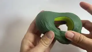 Sand filled avocado fidget toy