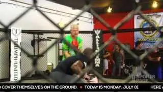 Kevin Acee goes in the octagon with MMA fighter, Phil Davis