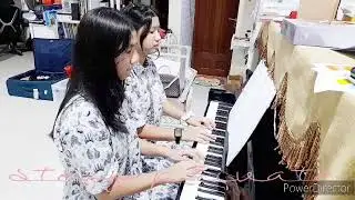 Teaching Caroline & Catherine - Pat-A-Pan - DuetTime Piano Christmas 1