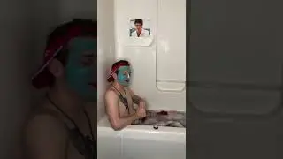 Lifeguard Josh Morris spits fire while taking a bubble bath