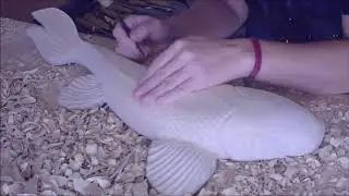 Wood carving a fish - timelapse