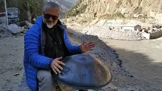 Sanj Hall and impromptu hangdrum playing near roadside construction site