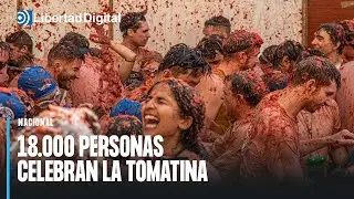 Cerca de 18.000 personas toman Buñol para teñir las calles de rojo en su Tomatina